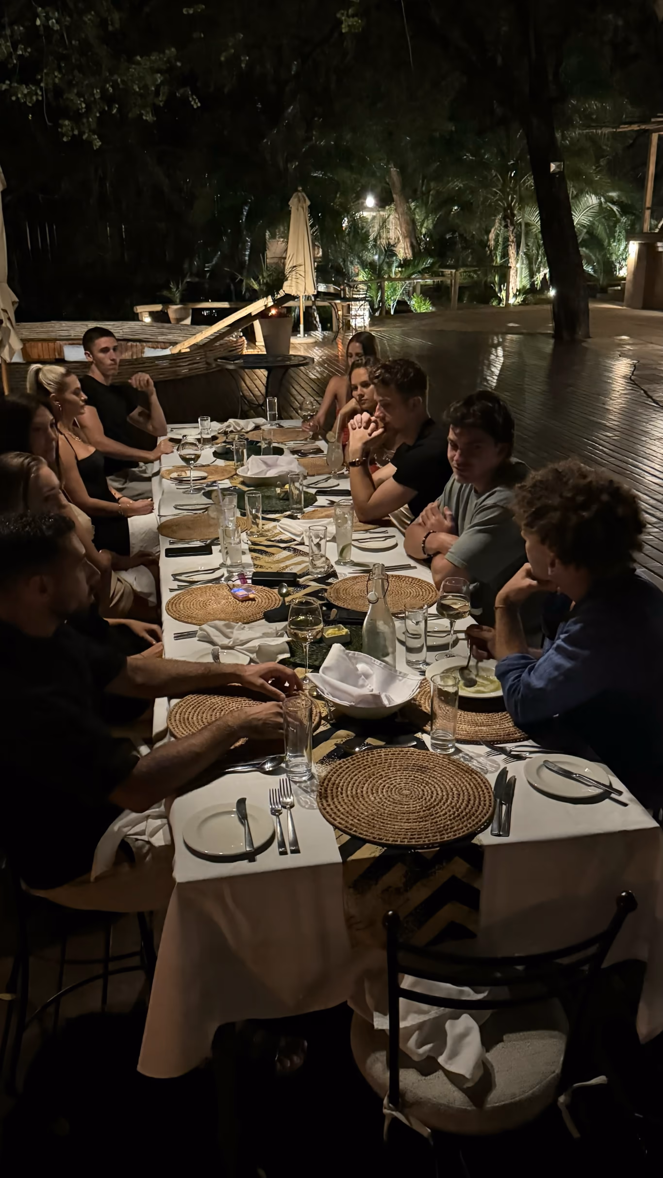 Founders working at tables by tall windows during a Helix mastermind session