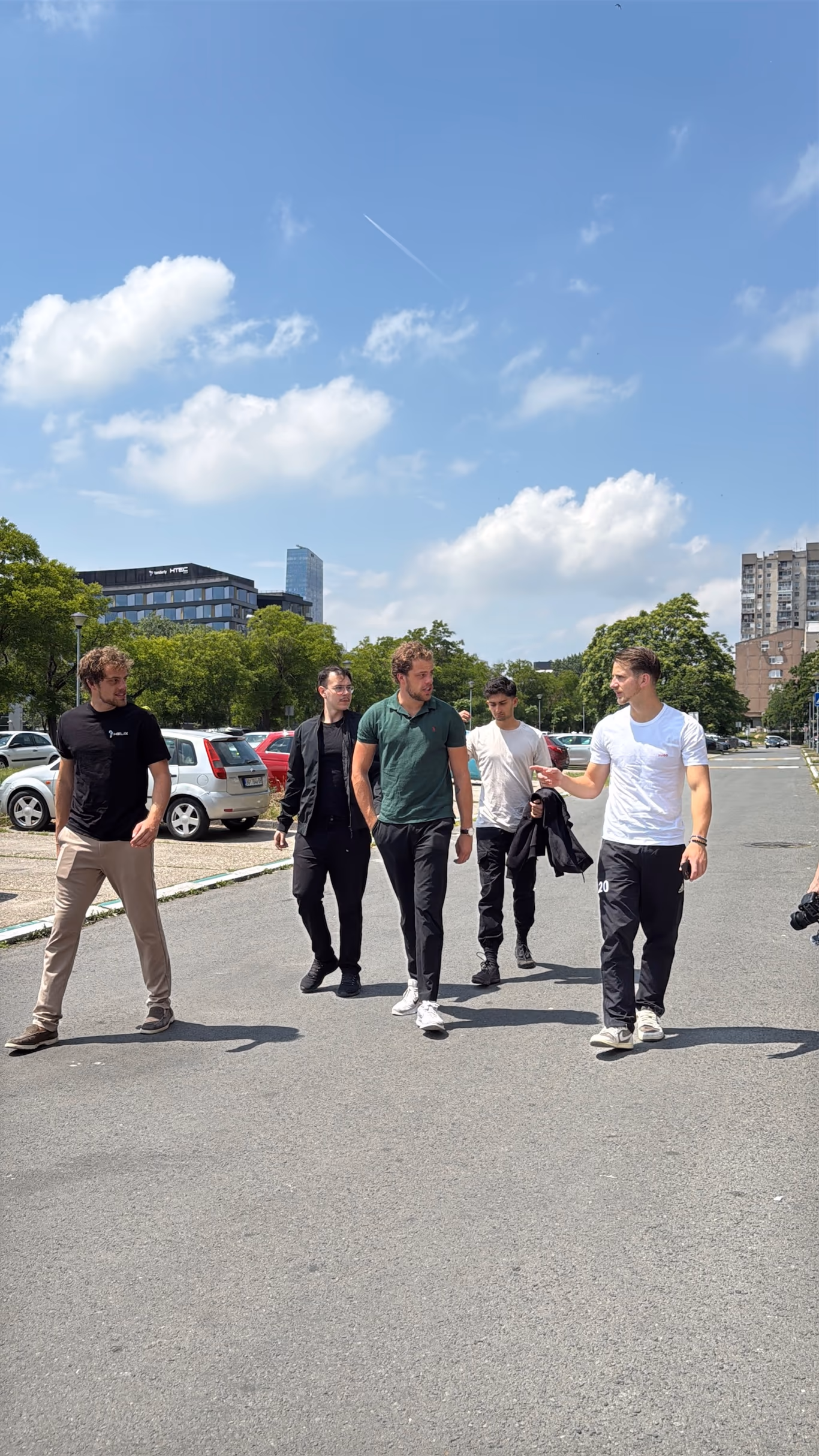 Founders arriving together on a city street for a Helix meet-up