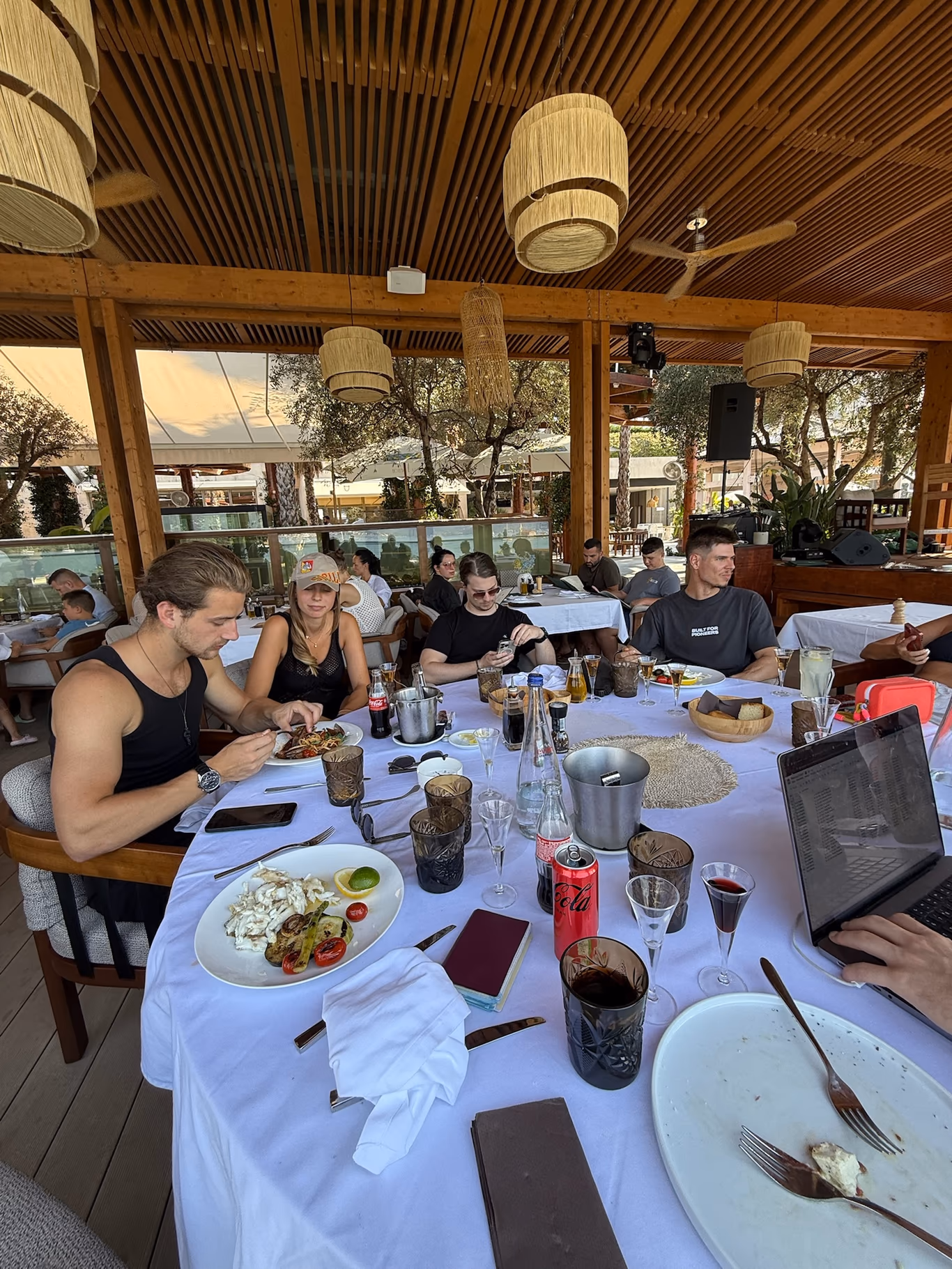 A long candlelit founder dinner — a new member's first table at Helix