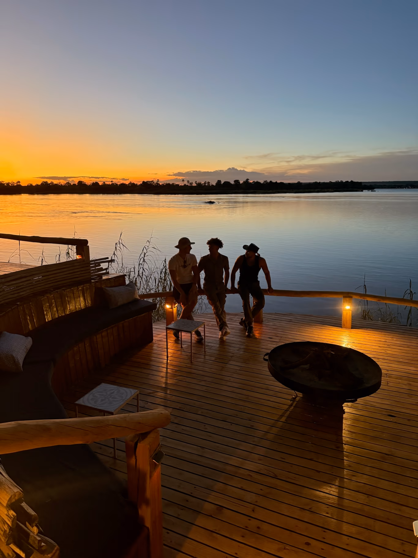 Founders at the waterside at sunset — quiet company at the end of a hard stretch