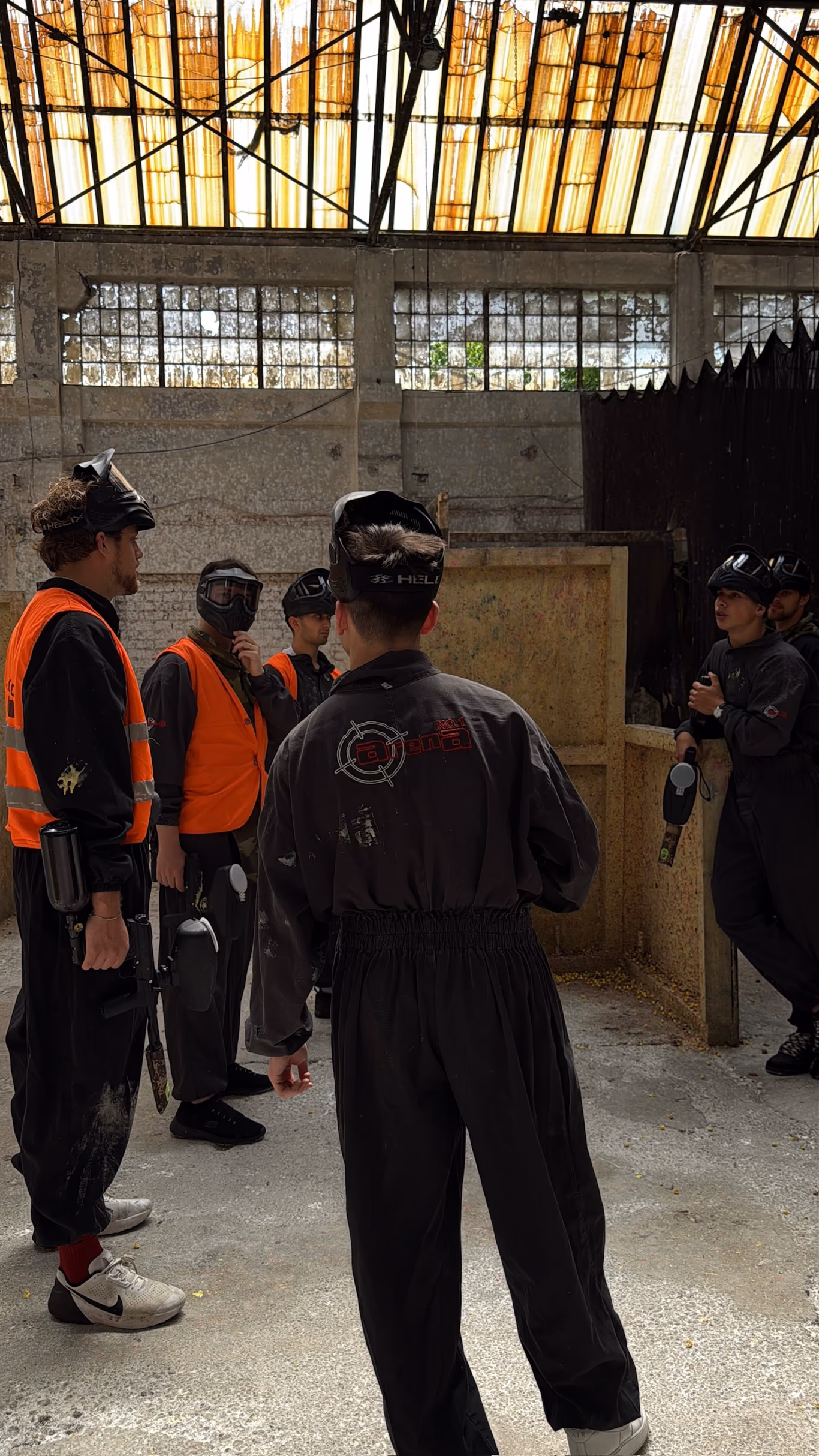 Founders in safety gear on a group activity — meeting people through doing, not small talk