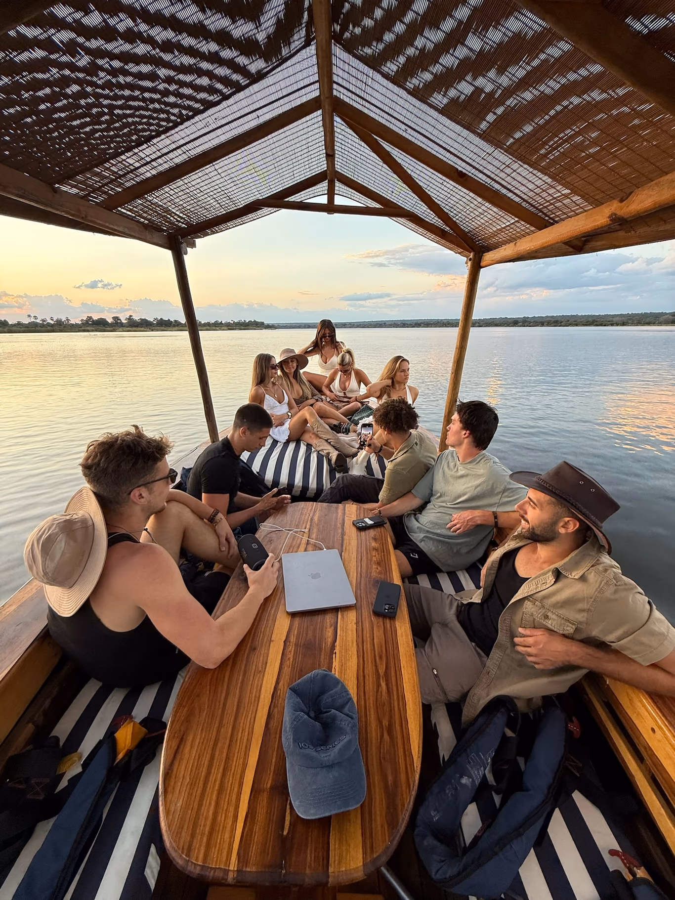 A Helix founder travel group on a boat — vetting decides what a trip is worth
